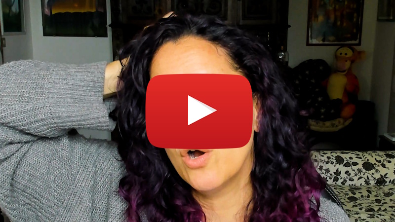 Tigrilla Gardenia with a play button over her face for Ep.98 Scribbles, Body Expression, and Emotional Memories | ReConnect with Plant Wisdom
